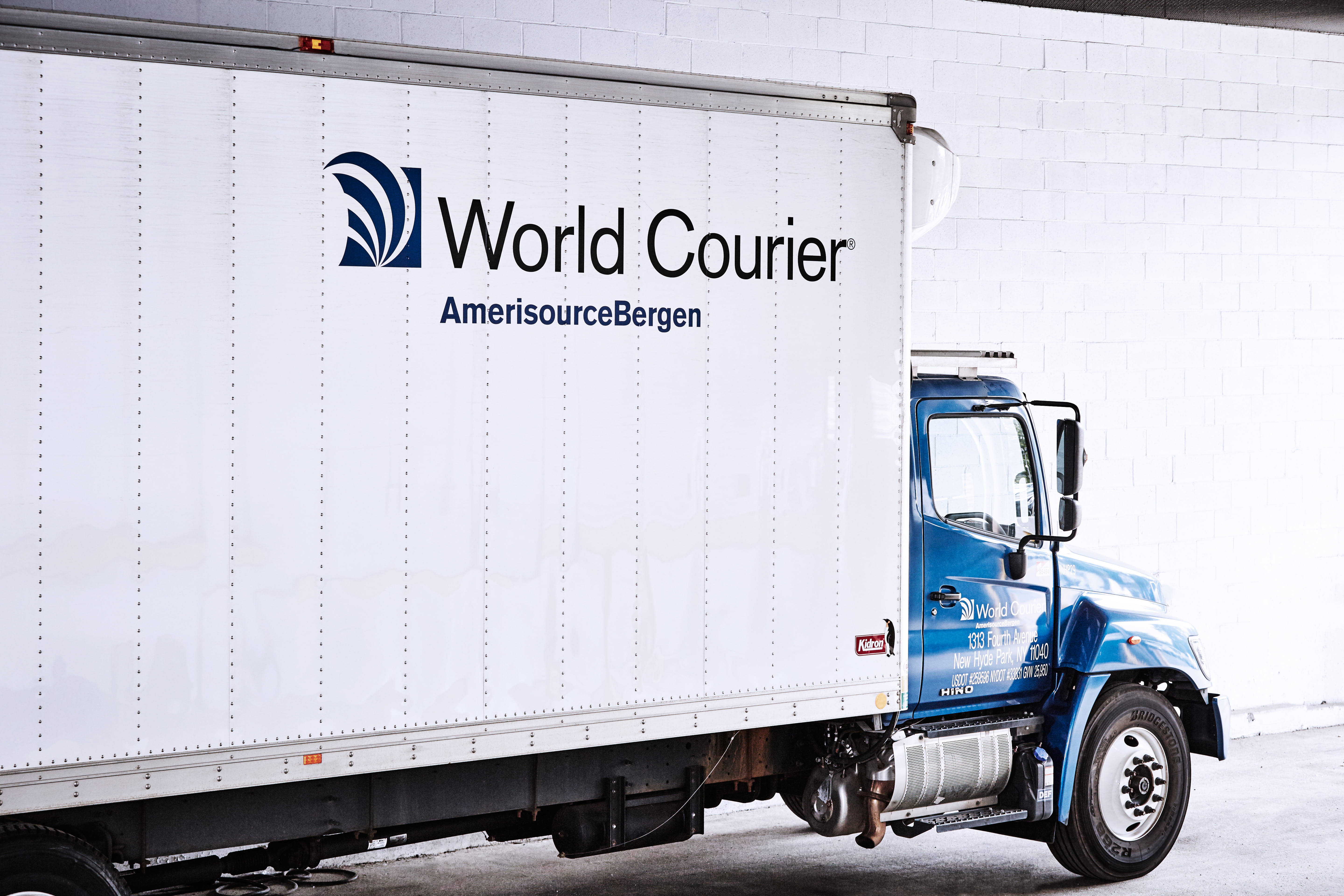 A large World Courier truck, or lorry.
